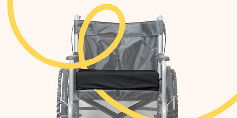 Cojín antiescaras Geriafy sobre silla de ruedas